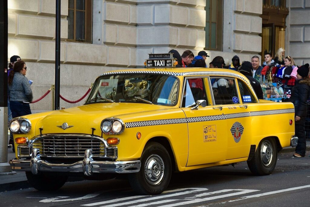 a yellow car on the street